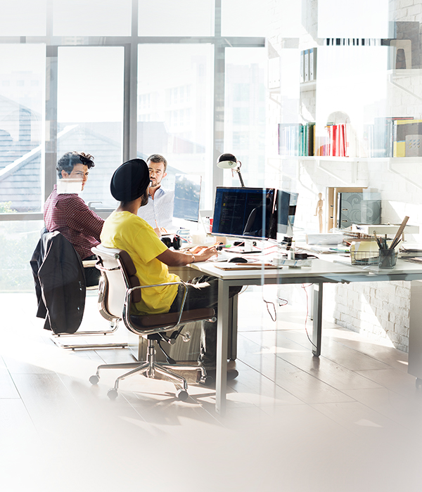 flat lay view from above on table workplace close-up man hands at home working typing on laptop online freelancer job, black empty screen, stationery